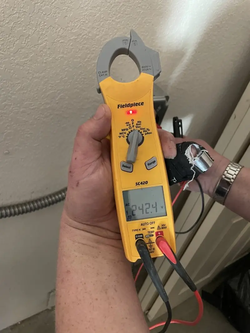 Voltage testing with clamp meter during Circuit Breaker Repair in LaFayette